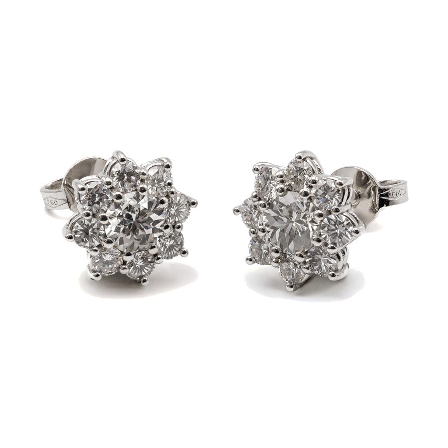 Margherite di diamanti – Diamante centrale con otto brillanti a petalo.